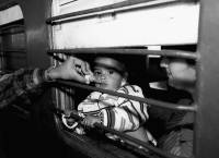 Child being immunized in New Delhi railway station.