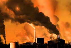 smoke stacks with smoke