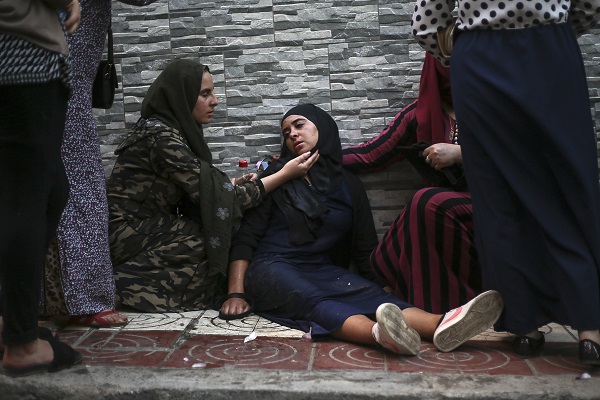A wounded protestor receives aid in Morocco