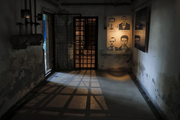 Portraits of Romanian torture victims projected in their old prison.