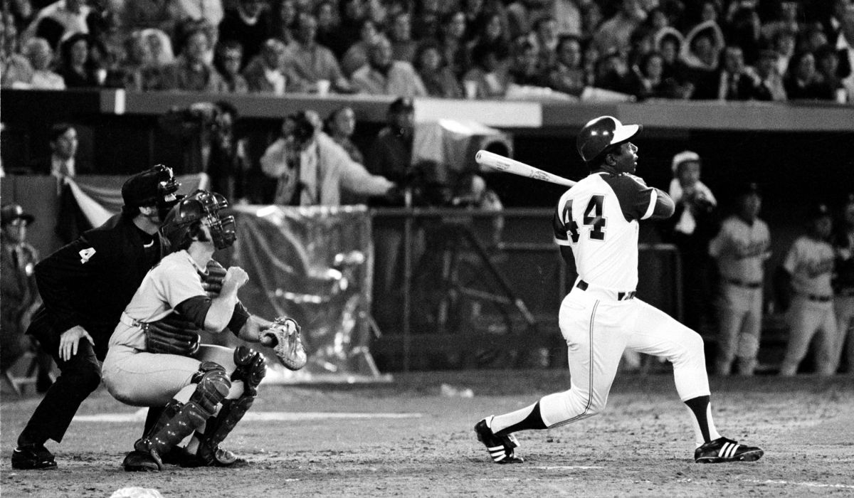 Henry "Hank" Aaron hit the 715th home run of his career, breaking Babe Ruth's record.