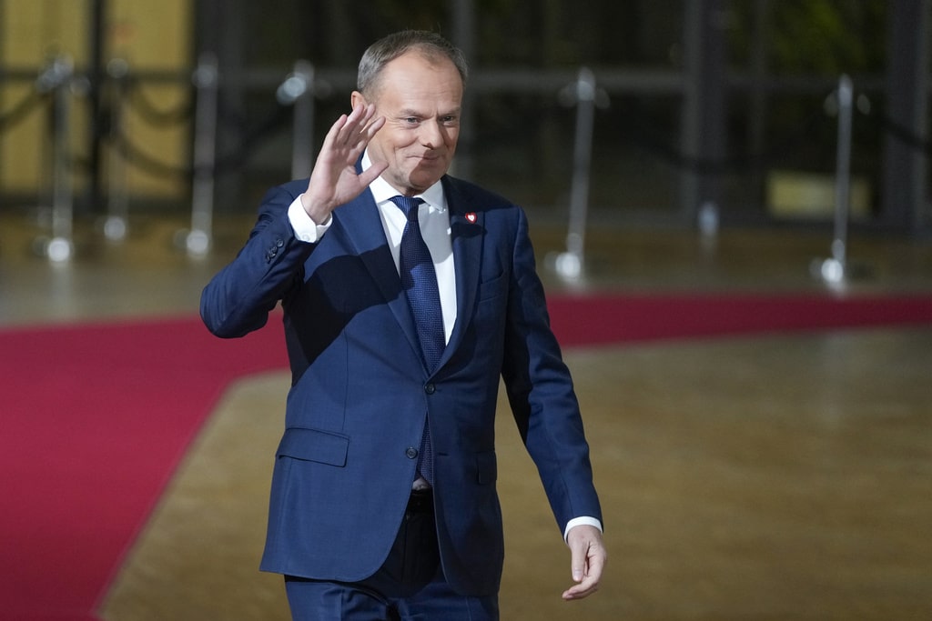 Poland's Prime Minister Donald Tusk arrives for an EU-Western Balkans summit at the European Council building in Brussels, Wednesday, Dec. 13, 2023.