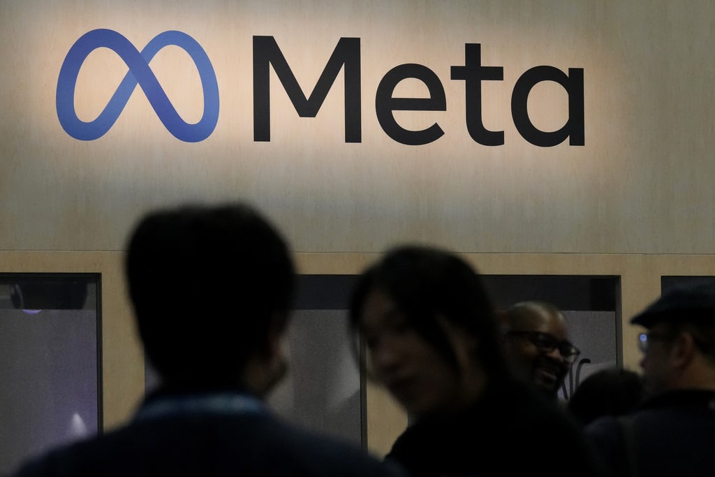 Attendees visit the Meta booth at the Game Developers Conference 2023 in San Francisco on March 22, 2023.
