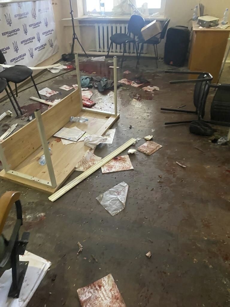 In this photo provided by the Ukrainian Police Press Office, blood is seen at the scene of an incident with exploded grenades, in Keretske, Zakarpattia region, Ukraine, Friday, Dec. 15, 2023.
