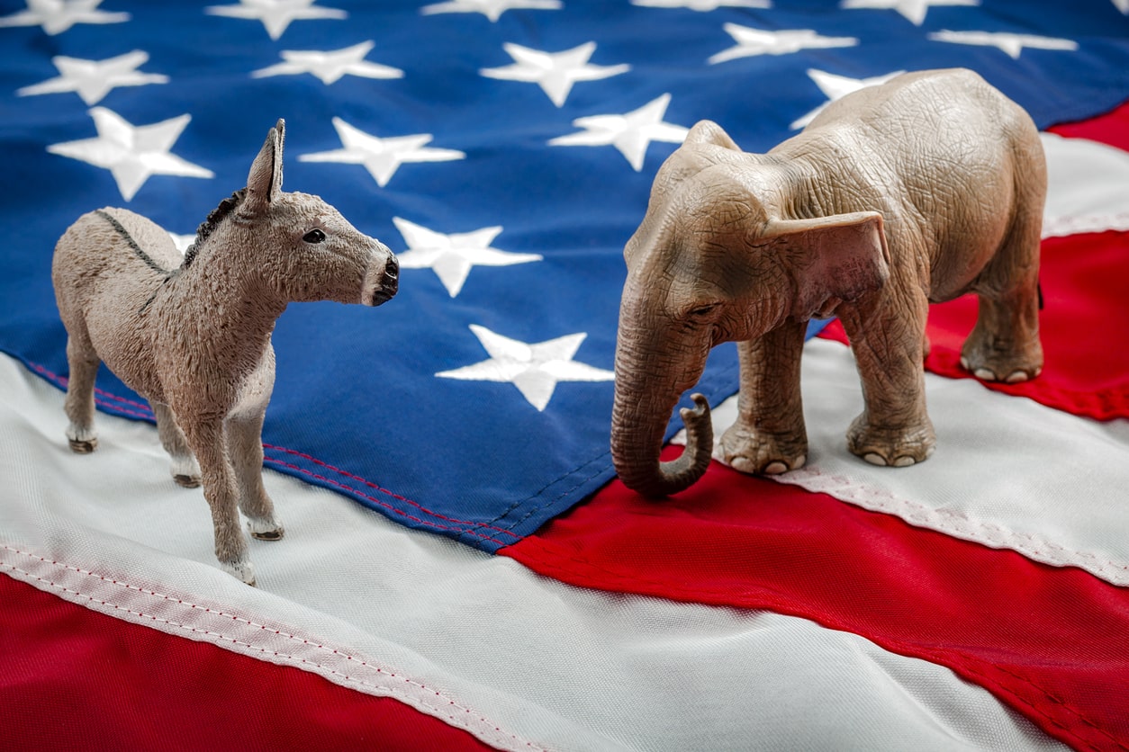 Democrats vs republicans are facing off in a ideological duel on the american flag.